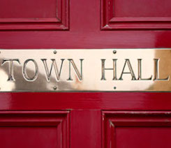 Picture of Town Hall Sign - This is an image of a town hall sign on a door.